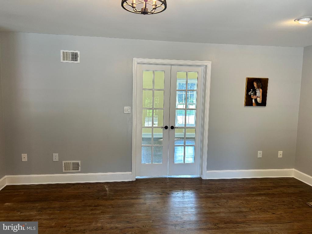 106 Hammersmith Lane Lititz, PA 17543 - Photo 28 of 28 a view of an empty room with wooden floor and a window