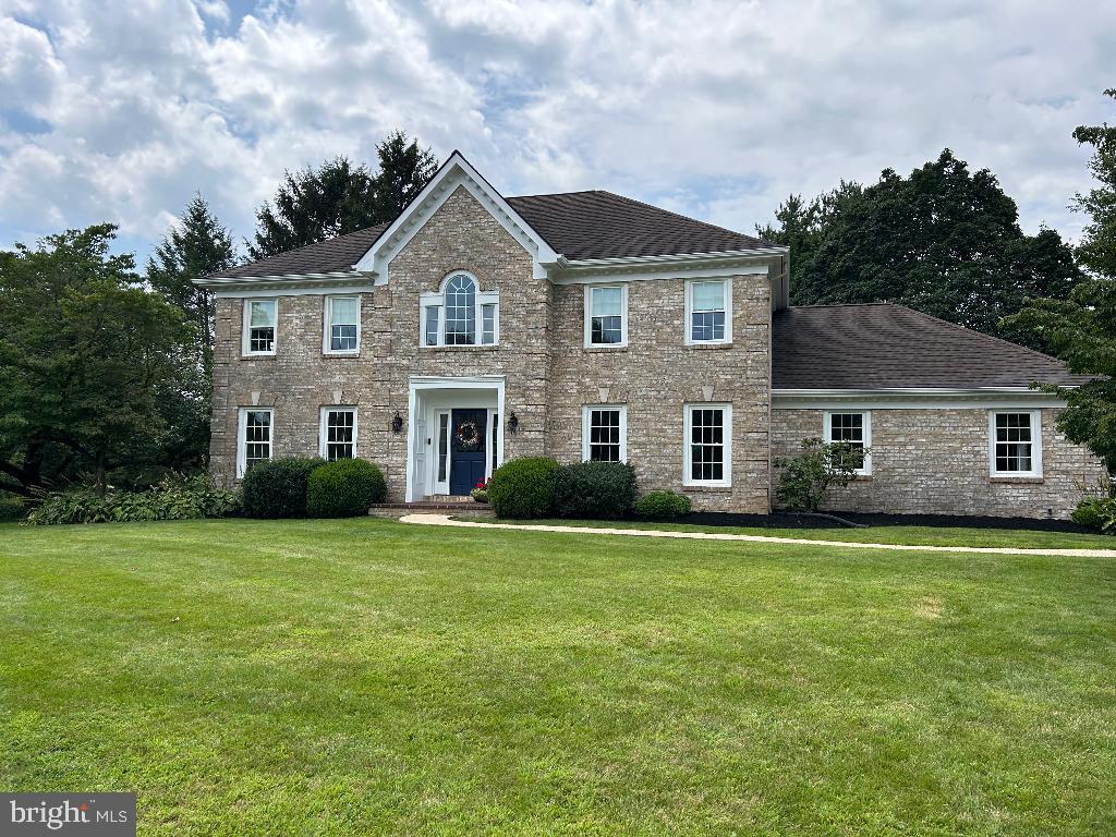 106 Hammersmith Lane Lititz, PA 17543 - Photo 5 of 28 a front view of a house with a garden