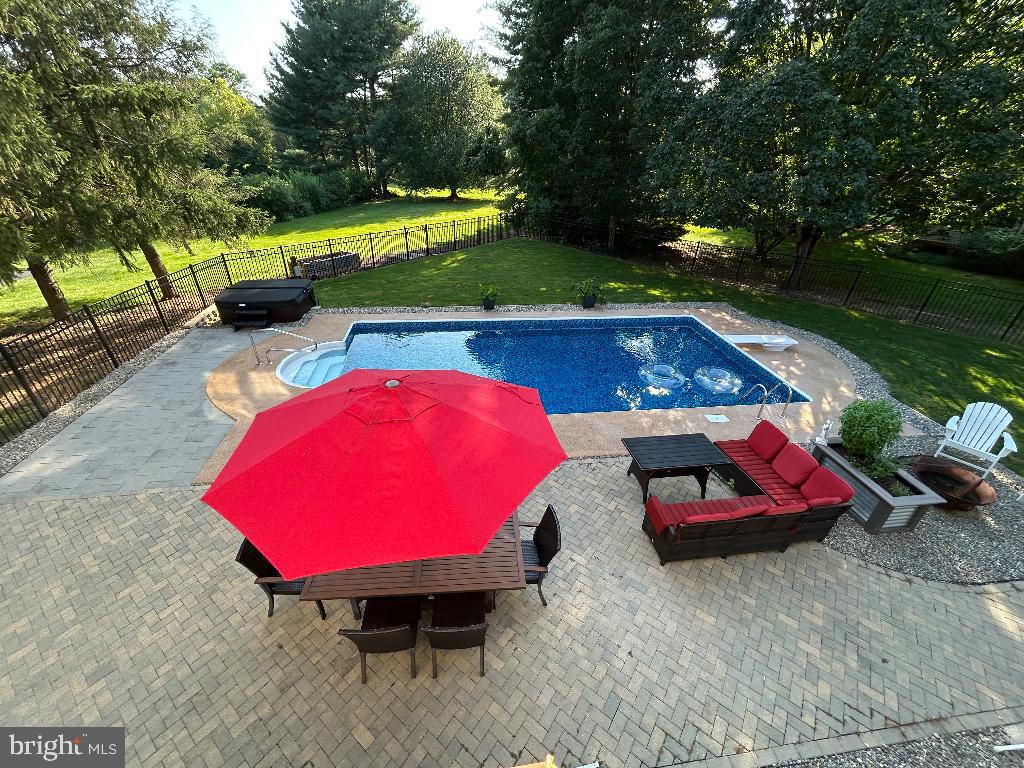 106 Hammersmith Lane Lititz, PA 17543 - Photo 6 of 28 an aerial view of a pool patio fireplace and outdoor seating