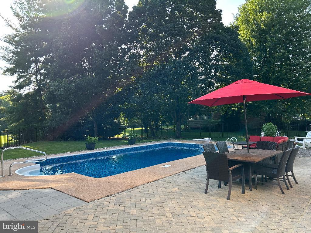 106 Hammersmith Lane Lititz, PA 17543 - Photo 8 of 28 a patio with swimming pool table and chairs