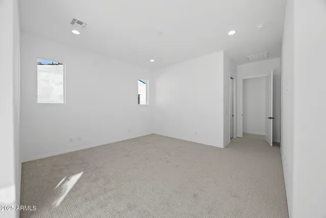 an empty room with a natural light
