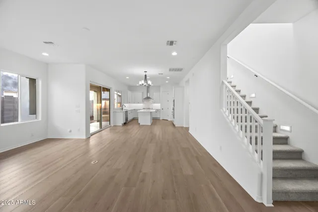 a view of entryway with wooden floor