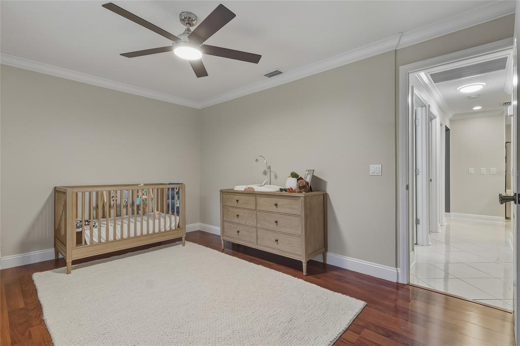 5475 Saddlebrook Way Wesley Chapel, FL 33543 - Photo 13 of 29 a room with furniture and wooden floor