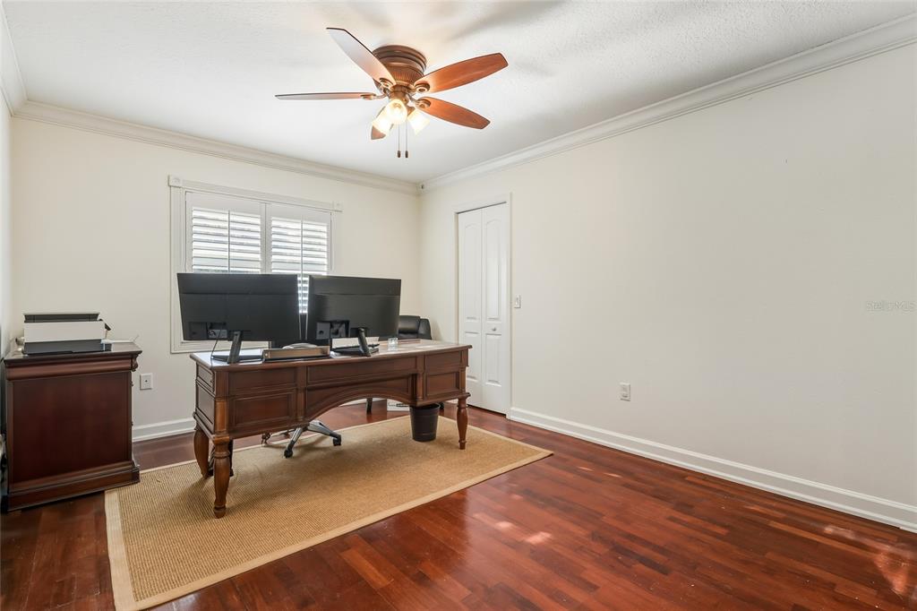 5475 Saddlebrook Way Wesley Chapel, FL 33543 - Photo 15 of 29 a view of a workspace with furniture and a window