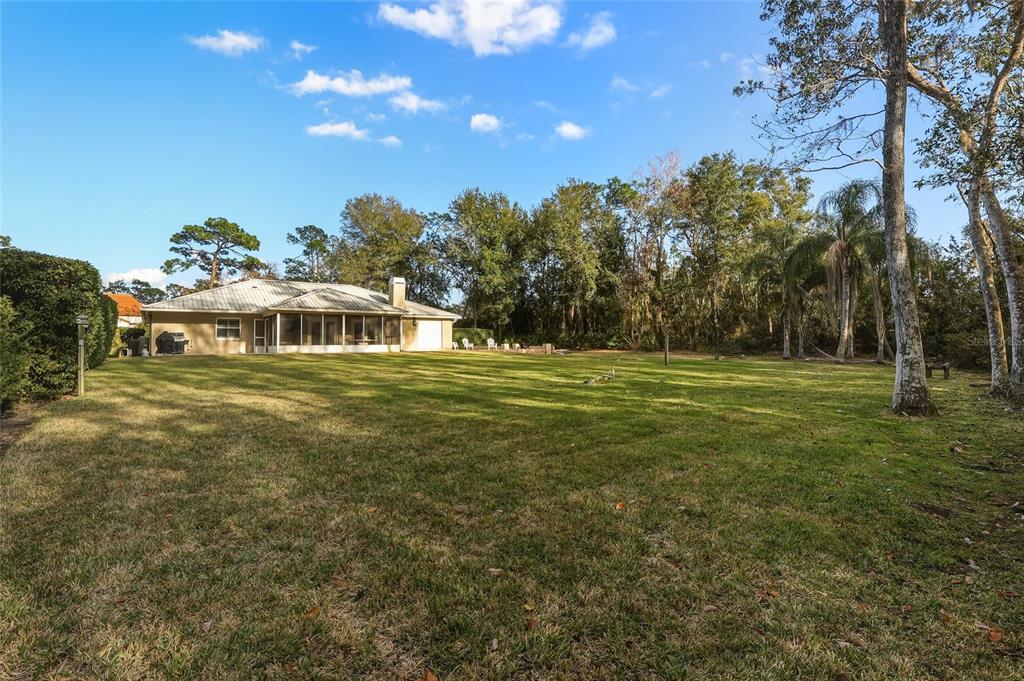 5475 Saddlebrook Way Wesley Chapel, FL 33543 - Photo 17 of 29 a view of a green field