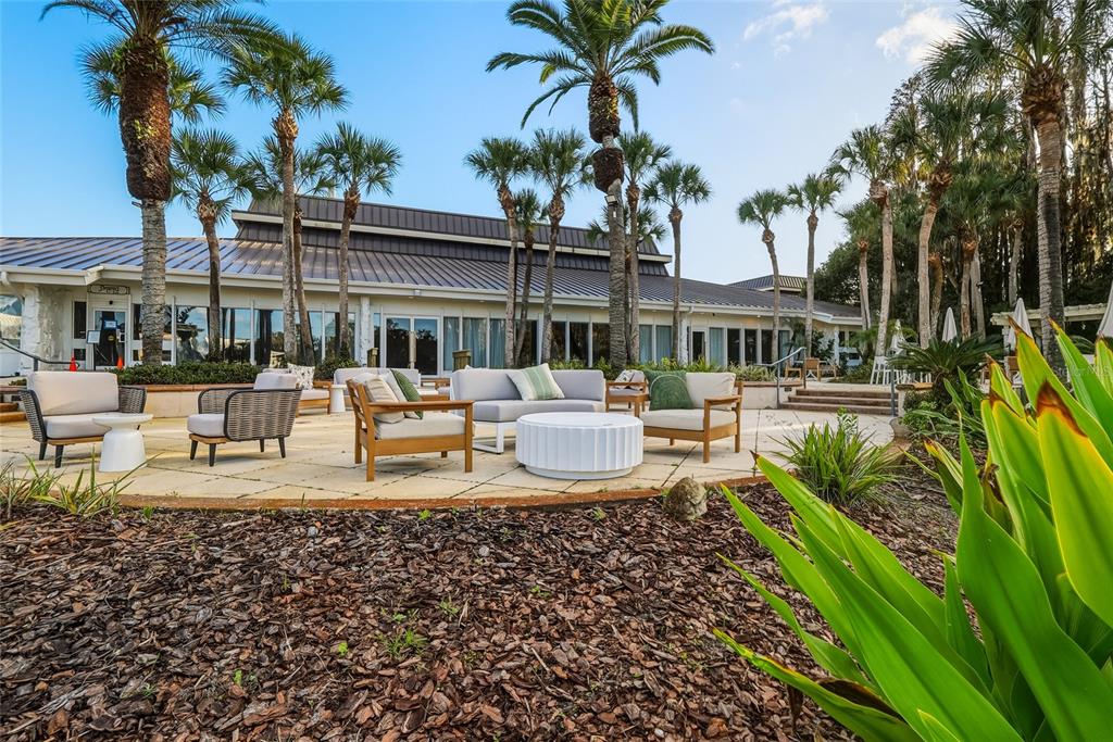 5475 Saddlebrook Way Wesley Chapel, FL 33543 - Photo 27 of 29 a view of a swimming pool with a patio