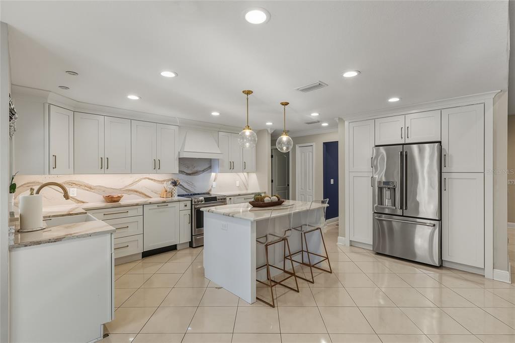 5475 Saddlebrook Way Wesley Chapel, FL 33543 - Photo 6 of 29 a kitchen with appliances cabinets and furniture