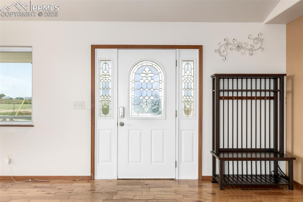 6065 Mulberry Road Calhan, CO 80808 - Photo 5 of 45 Foyer entrance with wood finished floors