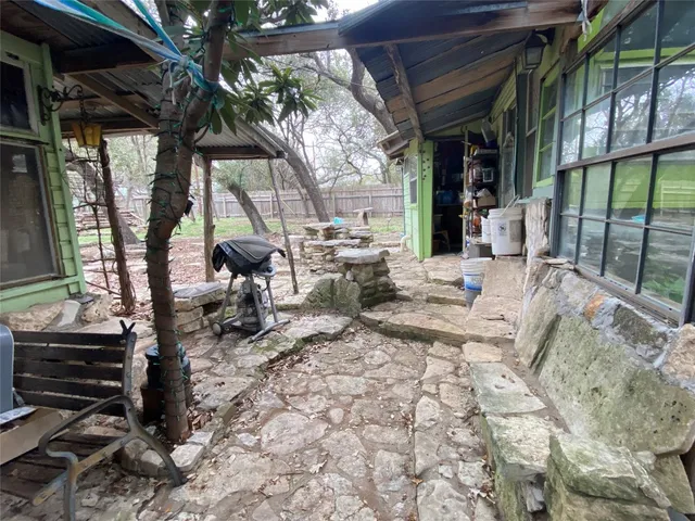 a view of backyard with green space