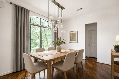 a kitchen with stainless steel appliances granite countertop a refrigerator stove a sink and dishwasher