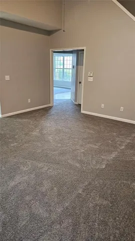 en empty room with windows