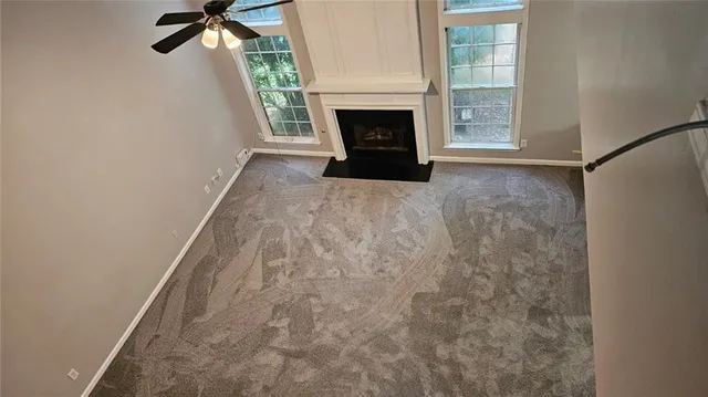 a view of a livingroom with a fireplace