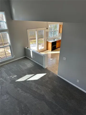 an empty room with windows