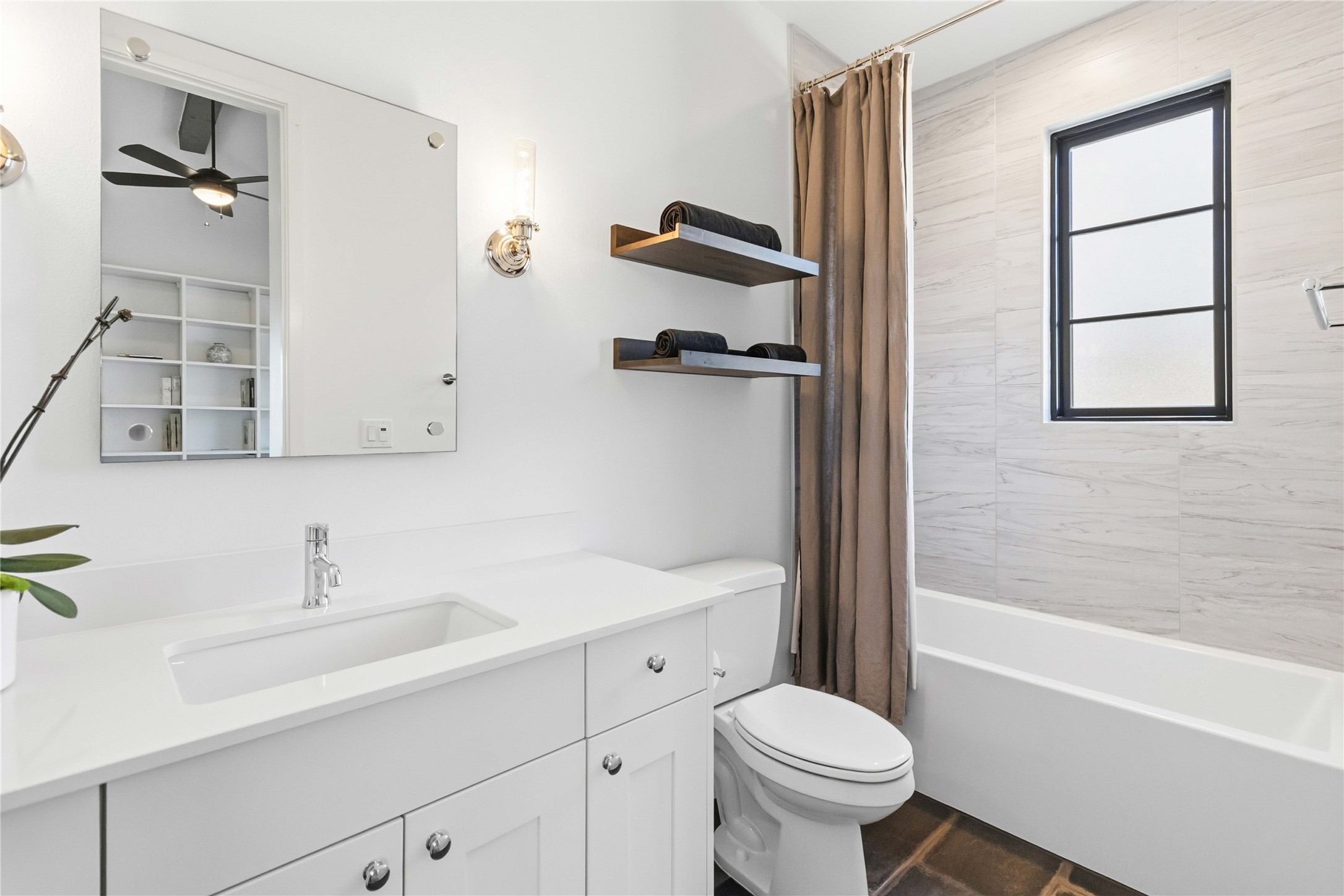 410 Kayak Way Austin, TX 78738 - Photo 27 of 39 a bathroom with a sink toilet and shower