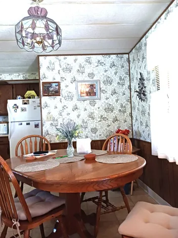 a table and chairs in a kid room