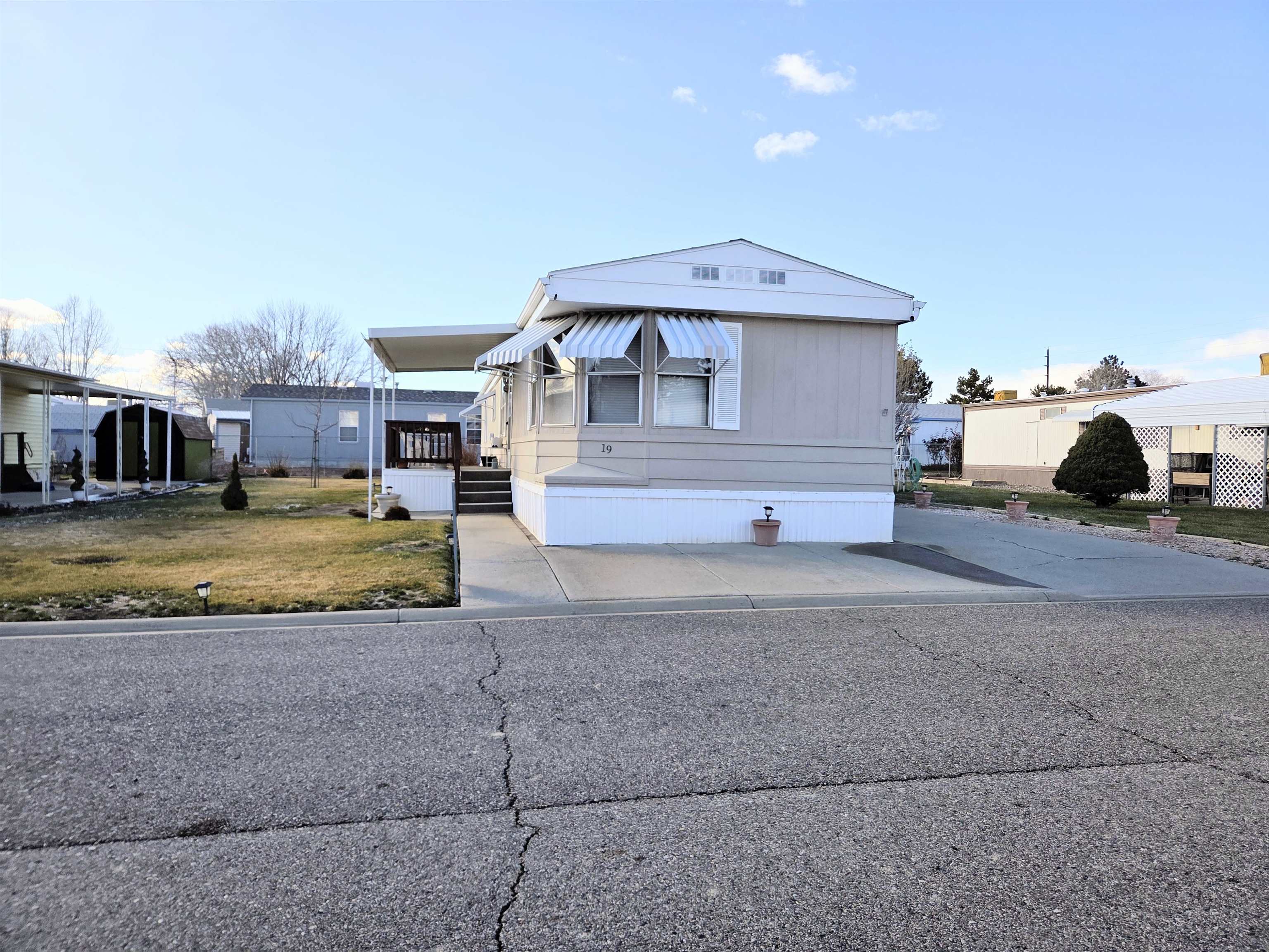 3195 F Road, Unit 19 Grand Junction, CO 81504 - Photo 19 of 20 a view of a house with a swimming pool