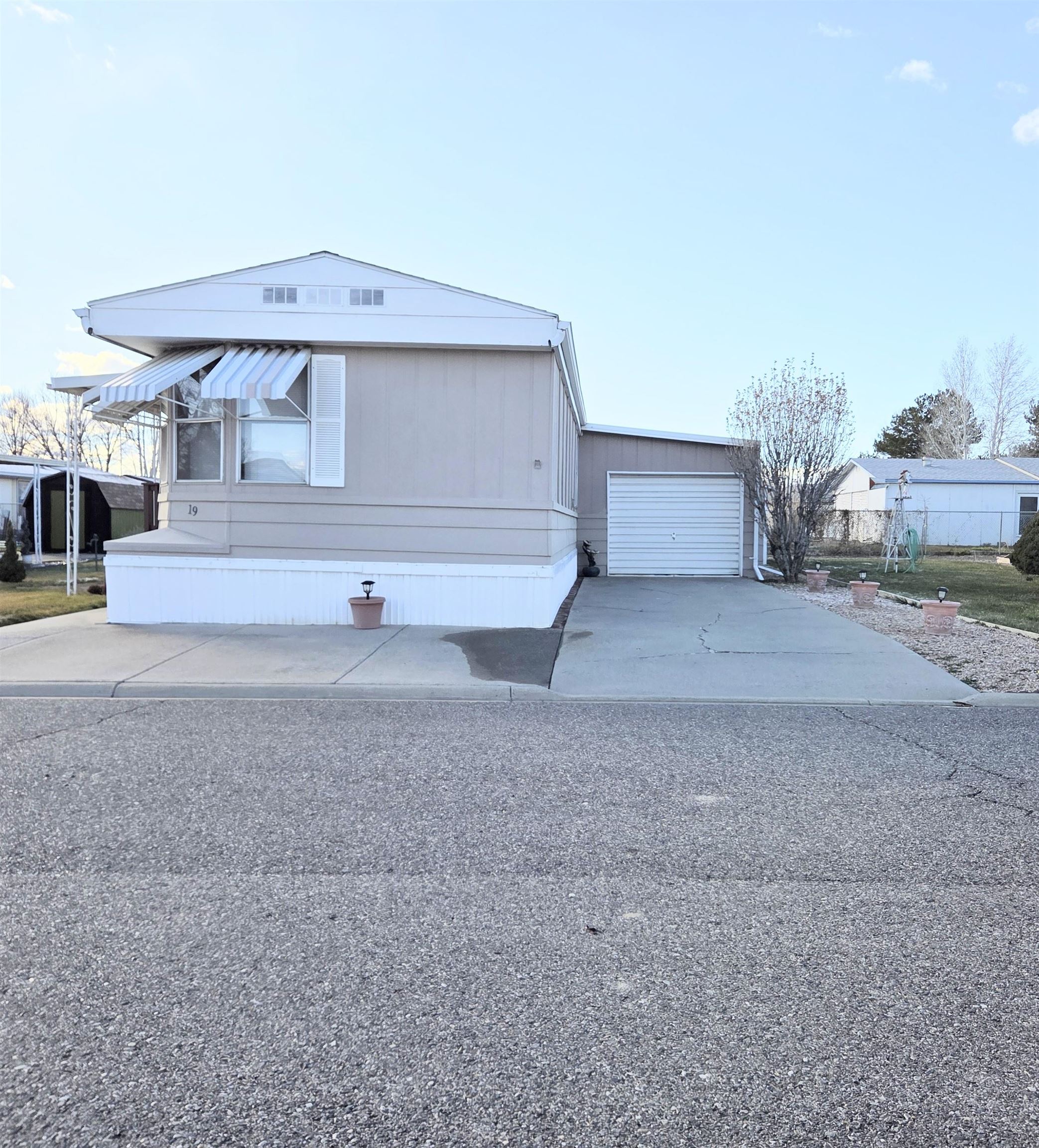 3195 F Road, Unit 19 Grand Junction, CO 81504 - Photo 20 of 20 a view of house with backyard and kitchen