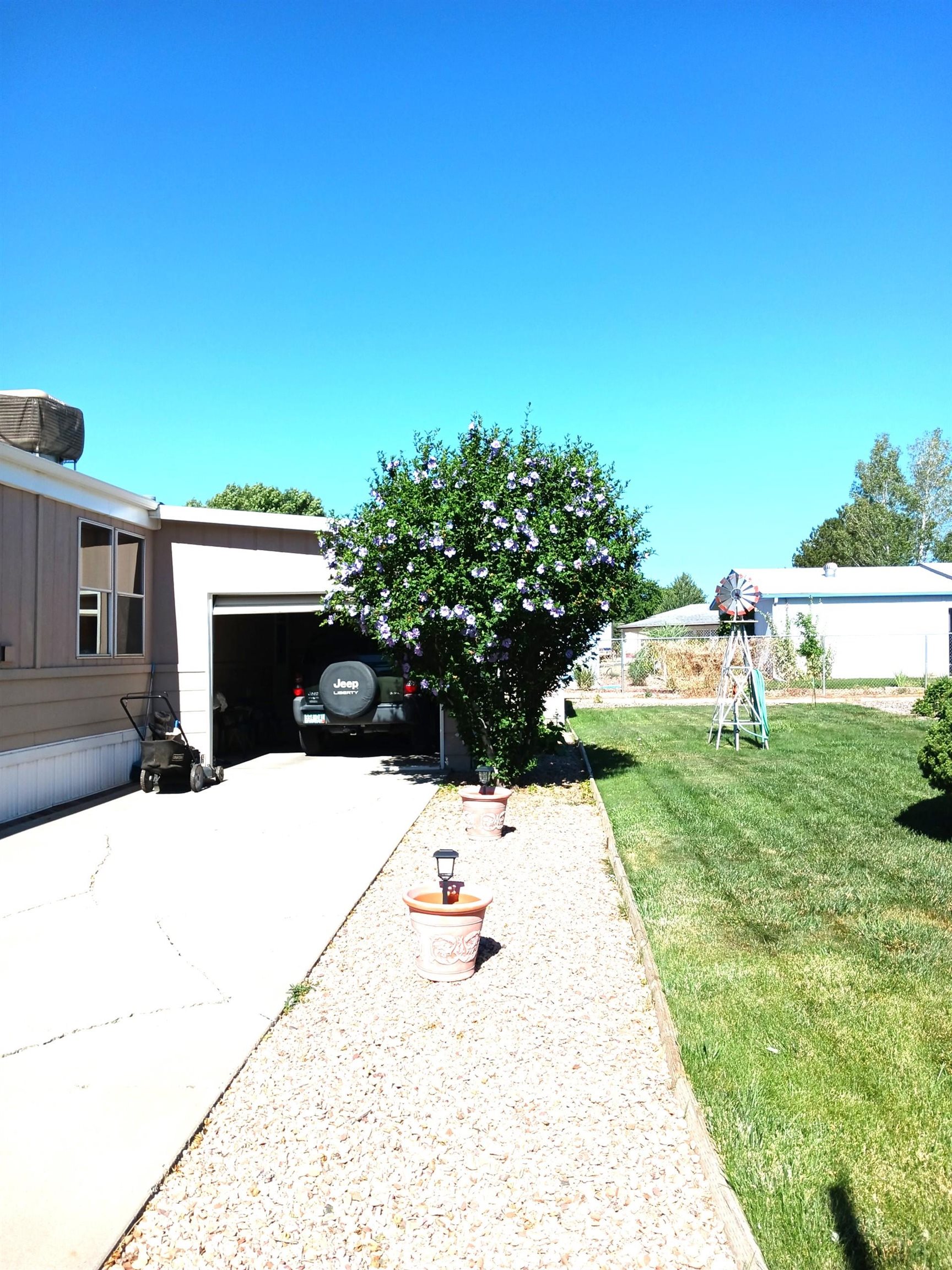 3195 F Road, Unit 19 Grand Junction, CO 81504 - Photo 4 of 20 a swimming pool with yard