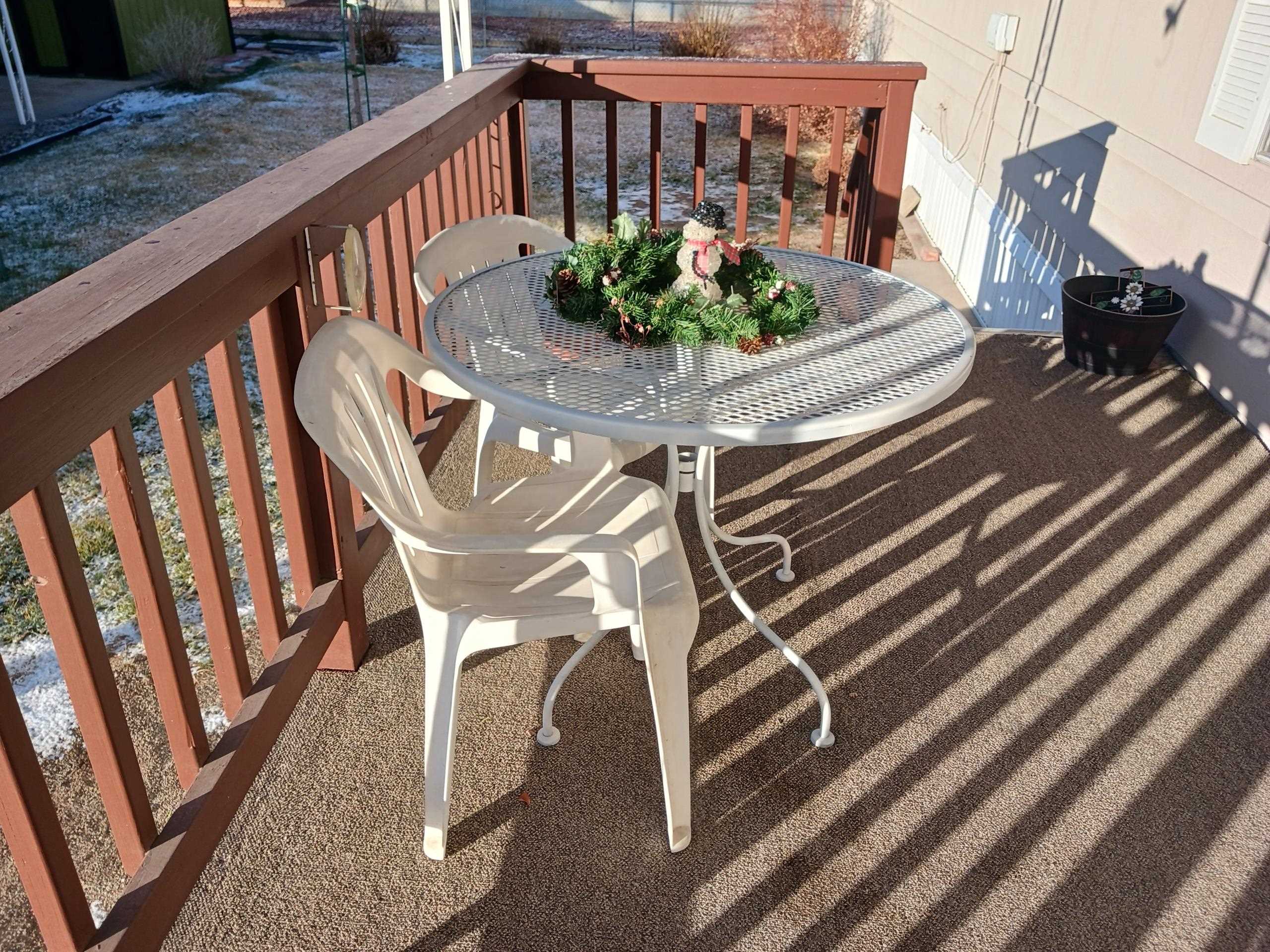 3195 F Road, Unit 19 Grand Junction, CO 81504 - Photo 8 of 20 a view of a balcony with furniture