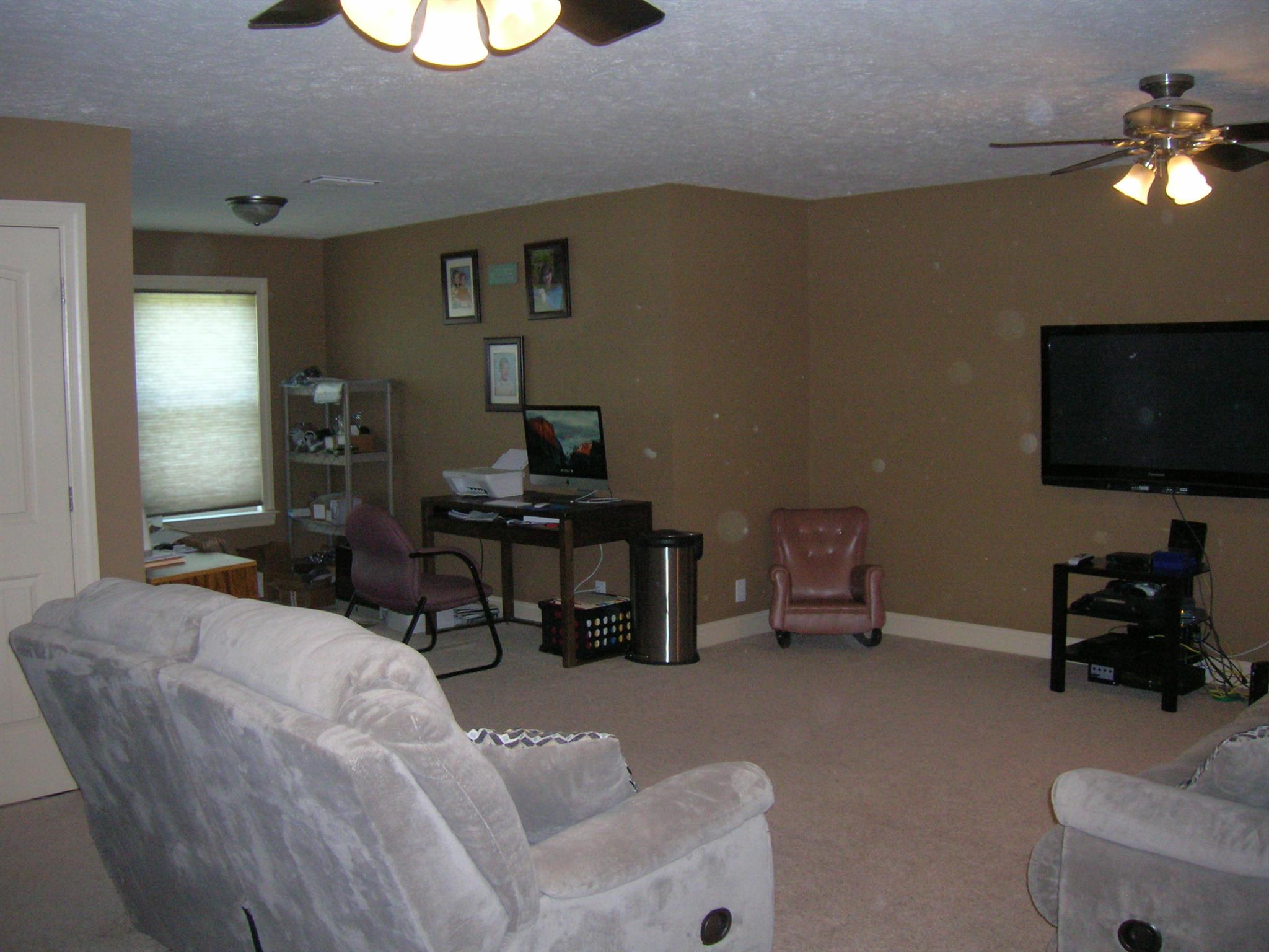 656 Crescent Road Murfreesboro, TN 37128 - Photo 2 of 15 a living room with furniture and a flat screen tv