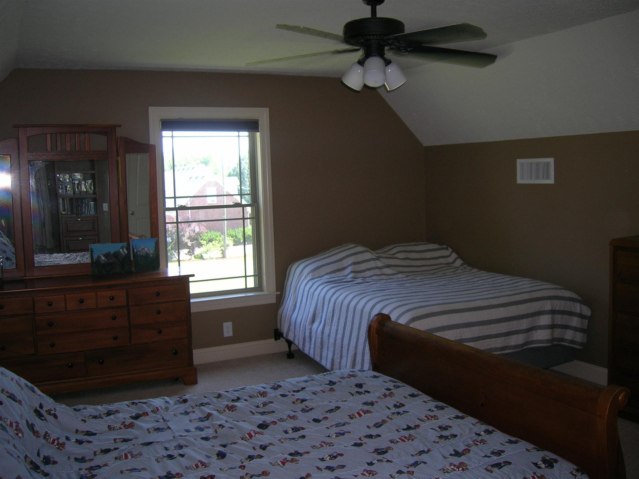 656 Crescent Road Murfreesboro, TN 37128 - Photo 8 of 15 a bedroom with a bed and a window