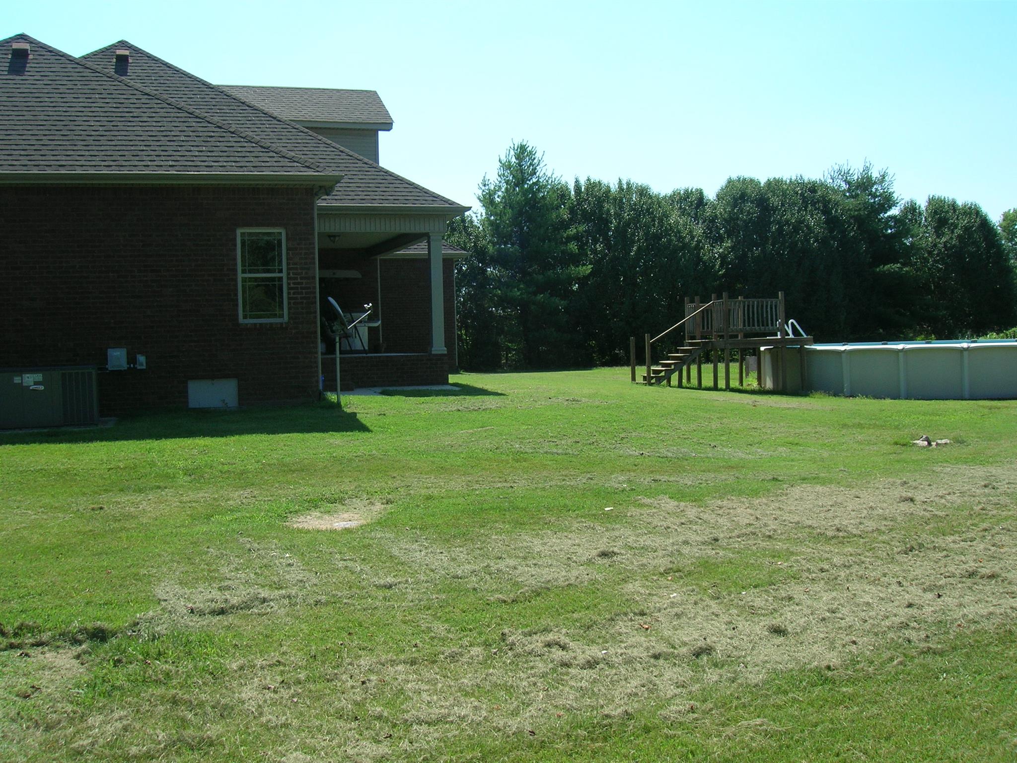 656 Crescent Road Murfreesboro, TN 37128 - Photo 10 of 15 a backyard of a house with table and chairs