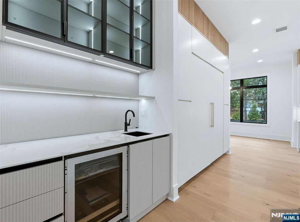 12 Irene Court Demarest, NJ 07627 - Photo 14 of 49 a kitchen with a stove and a sink