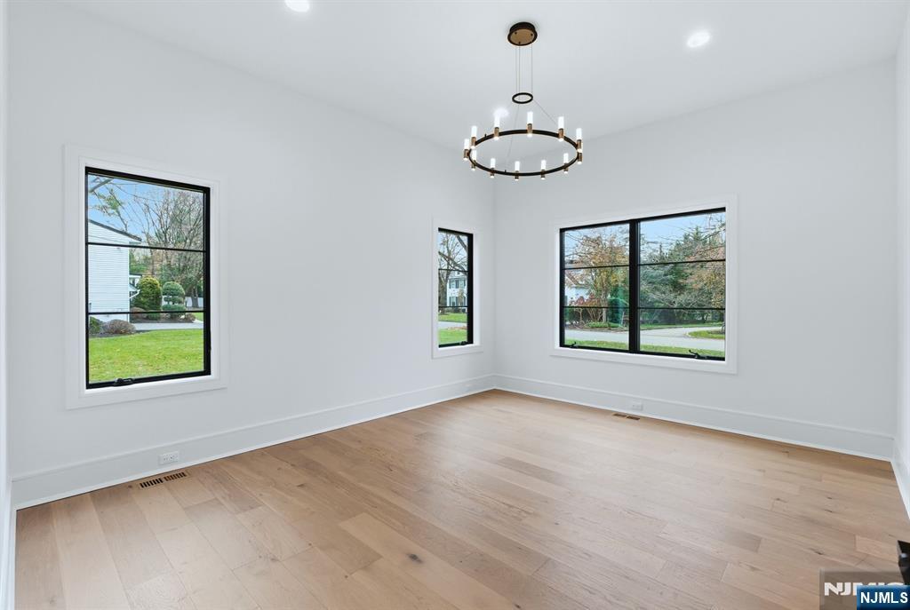 12 Irene Court Demarest, NJ 07627 - Photo 20 of 49 an empty room with a window