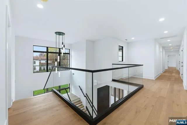 a view of a hallway with seating area