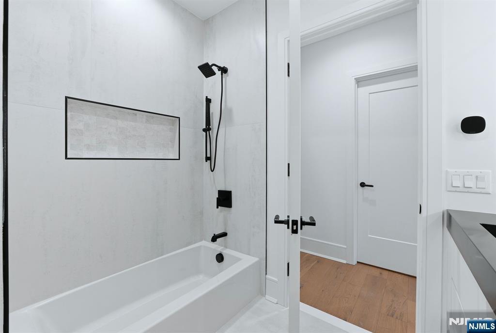 12 Irene Court Demarest, NJ 07627 - Photo 32 of 49 a bathroom with a bathtub and a shower