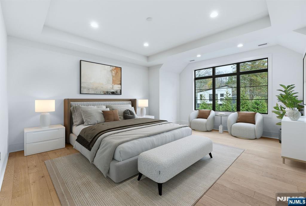 12 Irene Court Demarest, NJ 07627 - Photo 33 of 49 a bedroom with a large bed and a large window