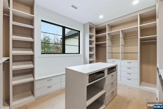 a kitchen with a stove and a cabinet