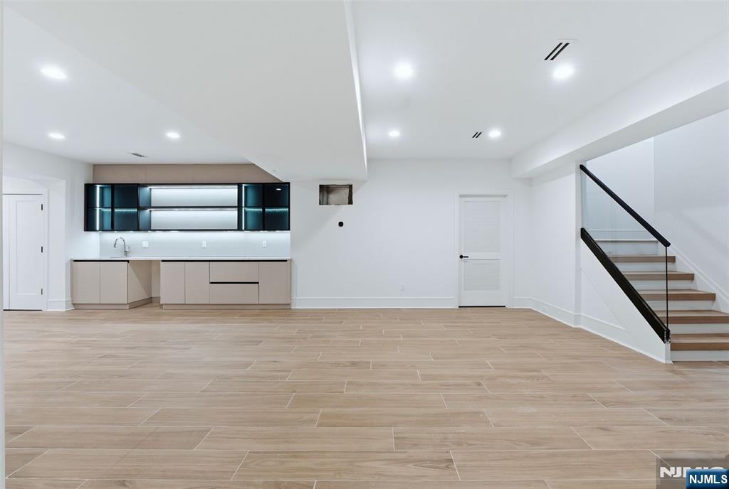 12 Irene Court Demarest, NJ 07627 - Photo 43 of 49 a view of empty room with wooden floor