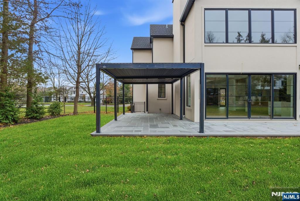 12 Irene Court Demarest, NJ 07627 - Photo 47 of 49 a view of a house with a yard and tree