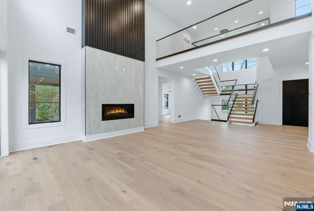 12 Irene Court Demarest, NJ 07627 - Photo 8 of 49 a view of a livingroom with furniture and window