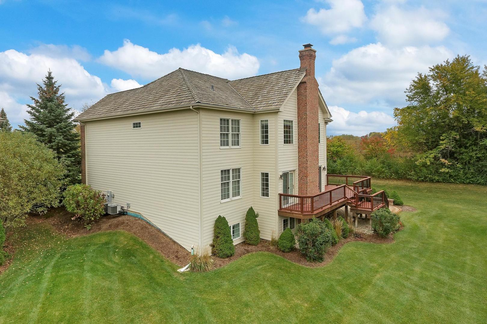 807 Poplar Court Inverness, IL 60010 - Photo 2 of 49 a view of a house with a yard