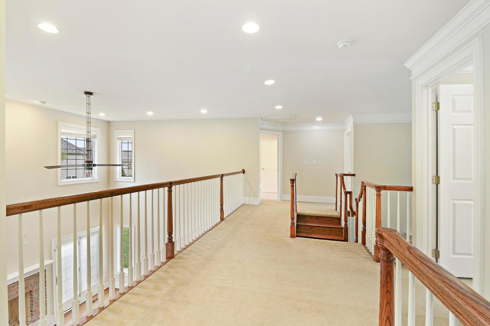 807 Poplar Court Inverness, IL 60010 - Photo 20 of 49 a view of a hallway with seating area
