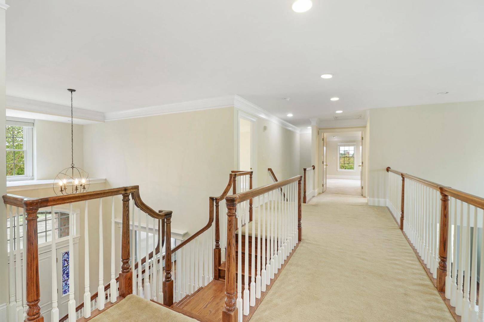 807 Poplar Court Inverness, IL 60010 - Photo 21 of 49 a view of a hallway with windows