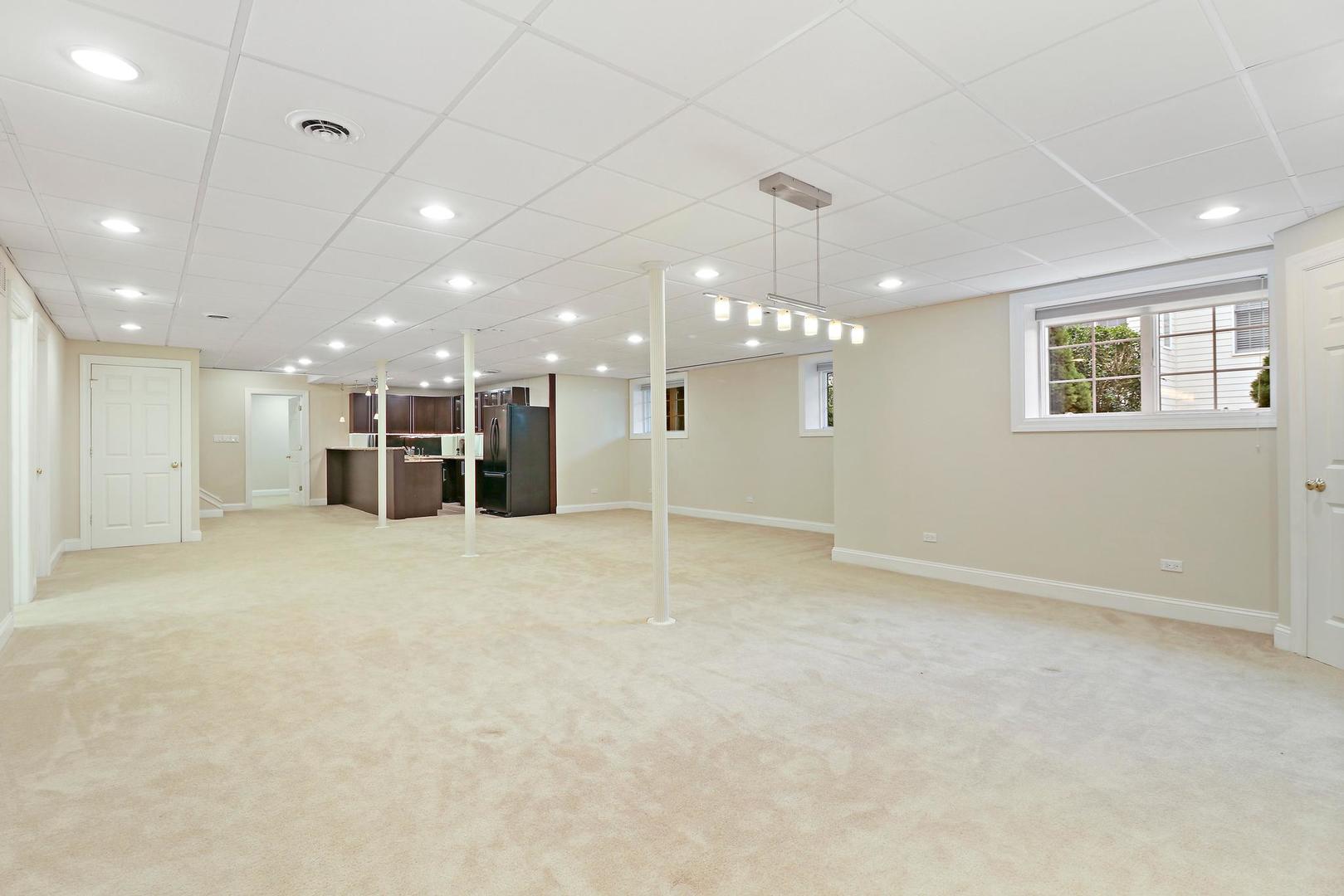 807 Poplar Court Inverness, IL 60010 - Photo 39 of 49 a view of an empty room with wooden floor