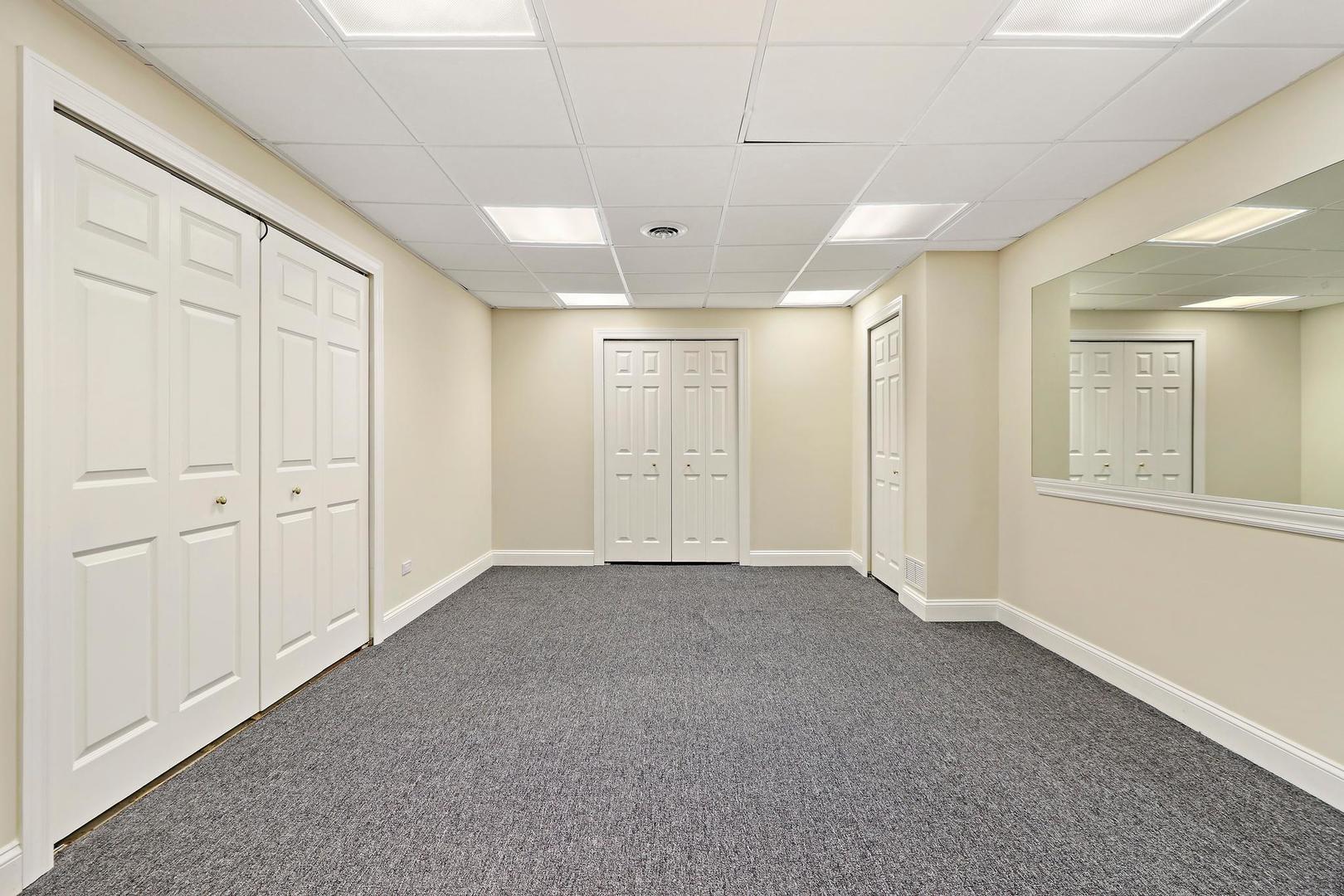807 Poplar Court Inverness, IL 60010 - Photo 40 of 49 a view of an empty room with a window