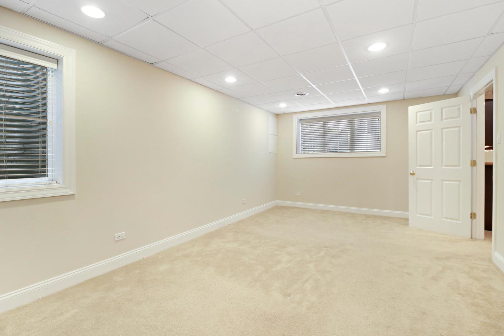 807 Poplar Court Inverness, IL 60010 - Photo 43 of 49 en empty room with windows
