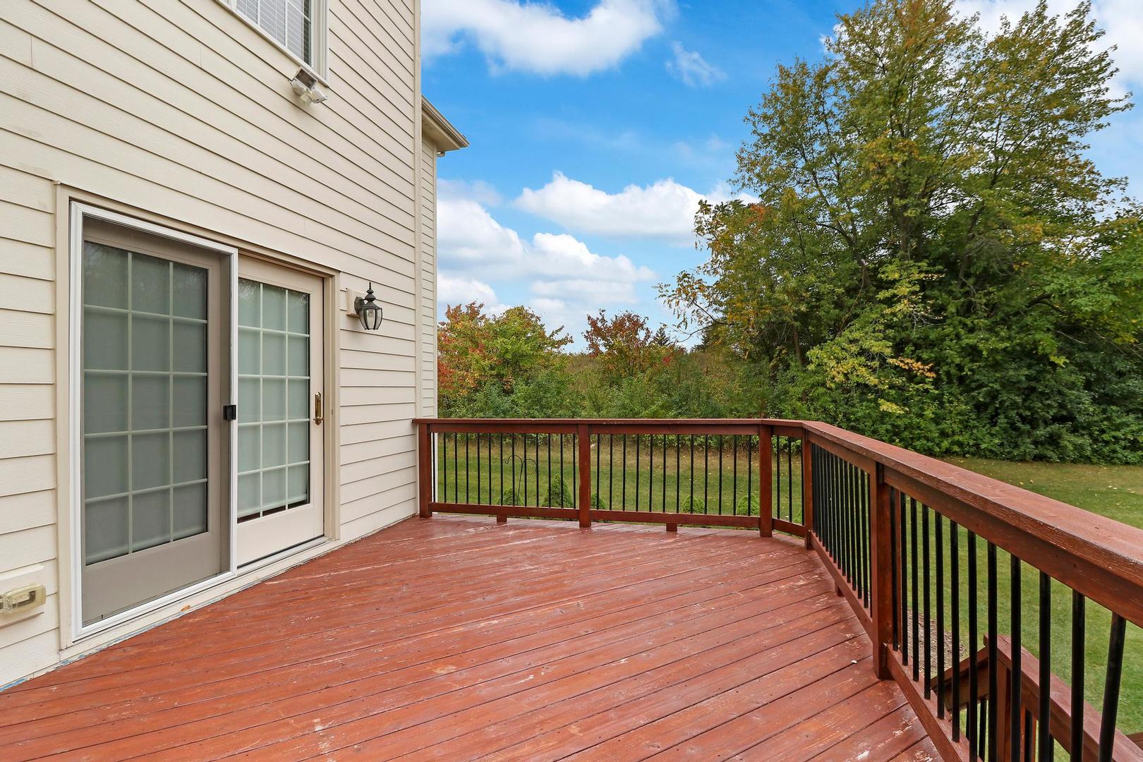 807 Poplar Court Inverness, IL 60010 - Photo 45 of 49 a view of a balcony with wooden floor