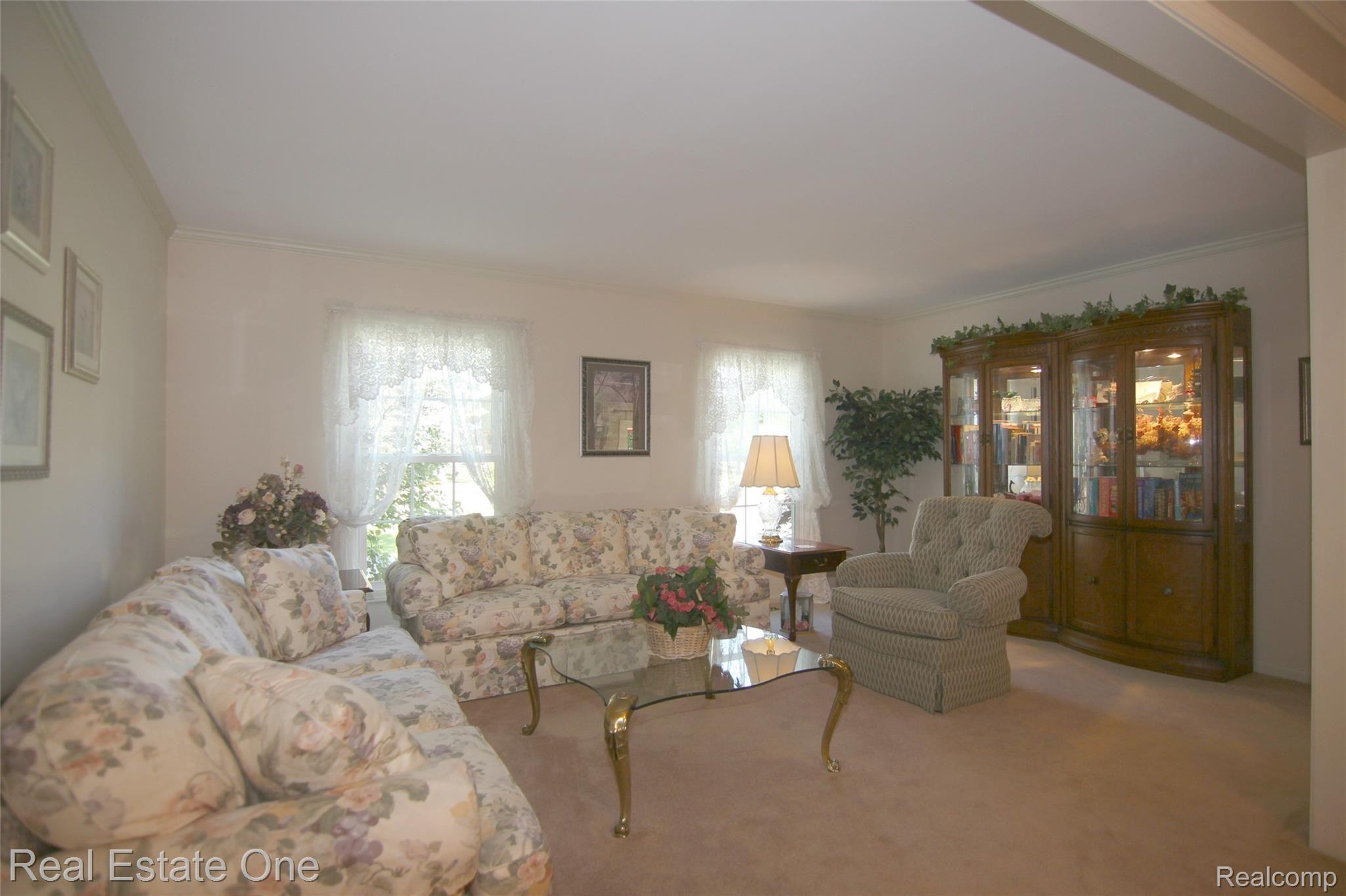 21602 Welch Road Northville, MI 48167 - Photo 16 of 29 Formal Living room with 2 large windows.