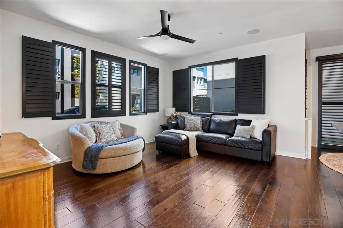 2123 Element Way Chula Vista, CA 91915 - Photo 15 of 42 a living room with furniture and wooden floor