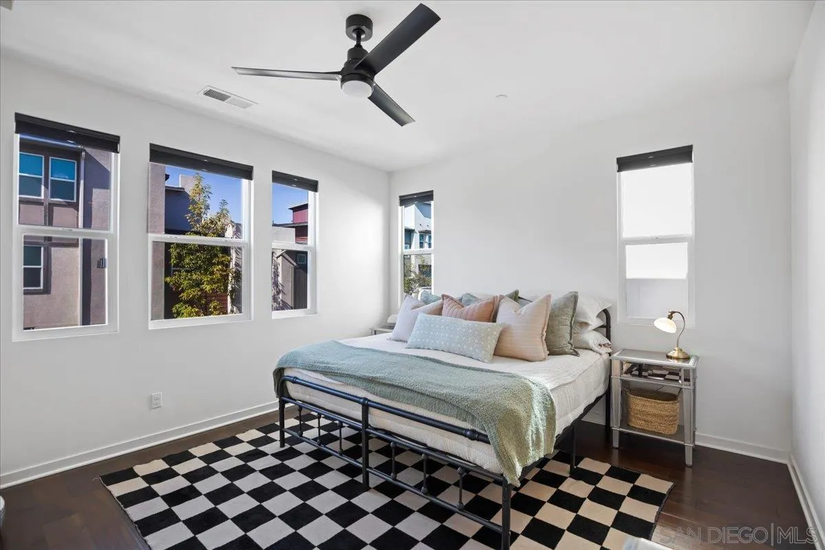 2123 Element Way Chula Vista, CA 91915 - Photo 24 of 42 a bedroom with a bed and a window