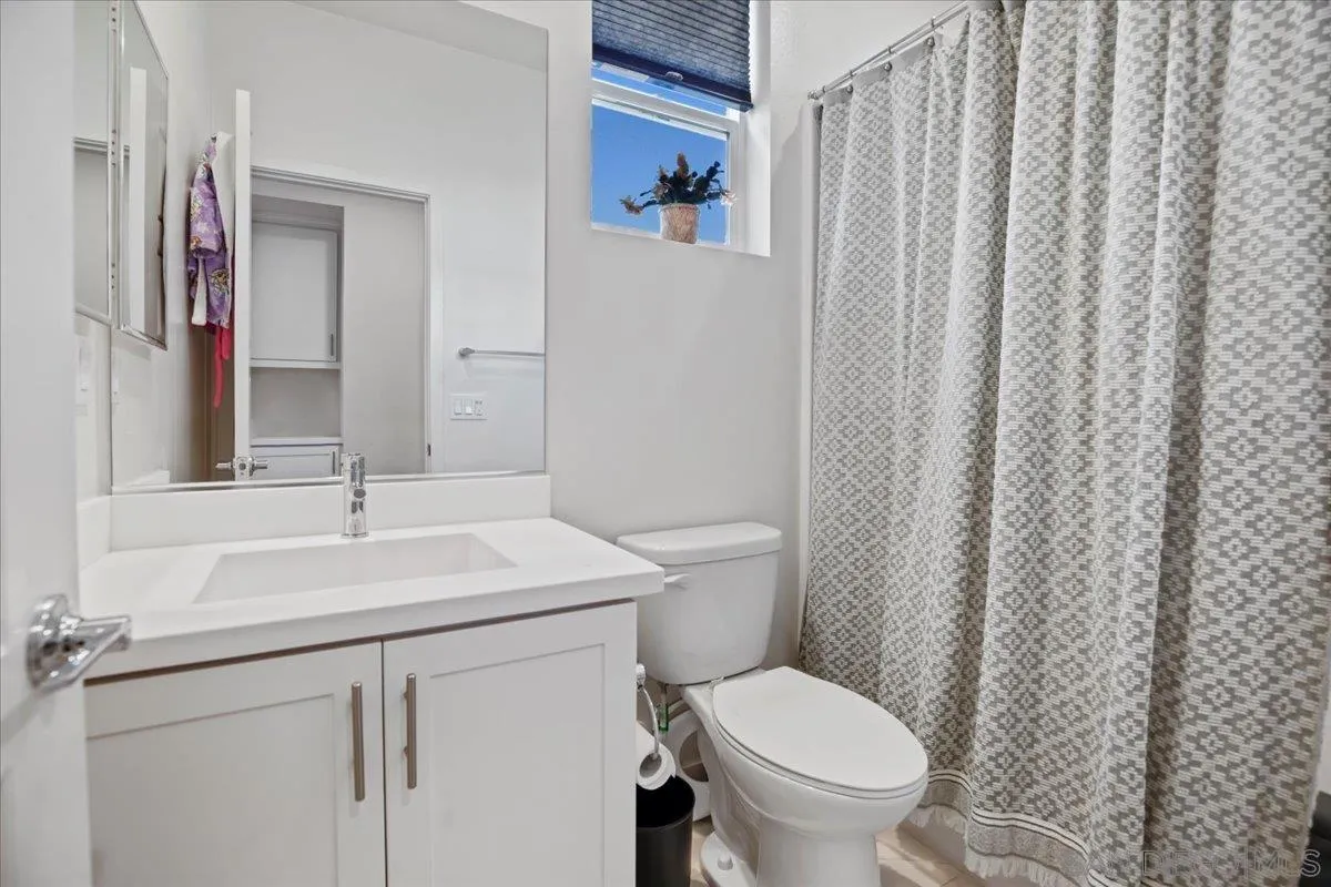 2123 Element Way Chula Vista, CA 91915 - Photo 34 of 42 a bathroom with a sink and a toilet