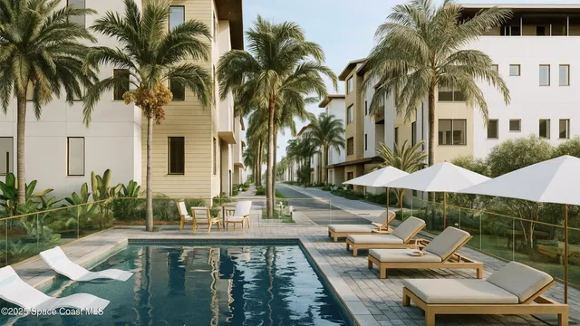 a view of swimming pool with chairs and table under an umbrella