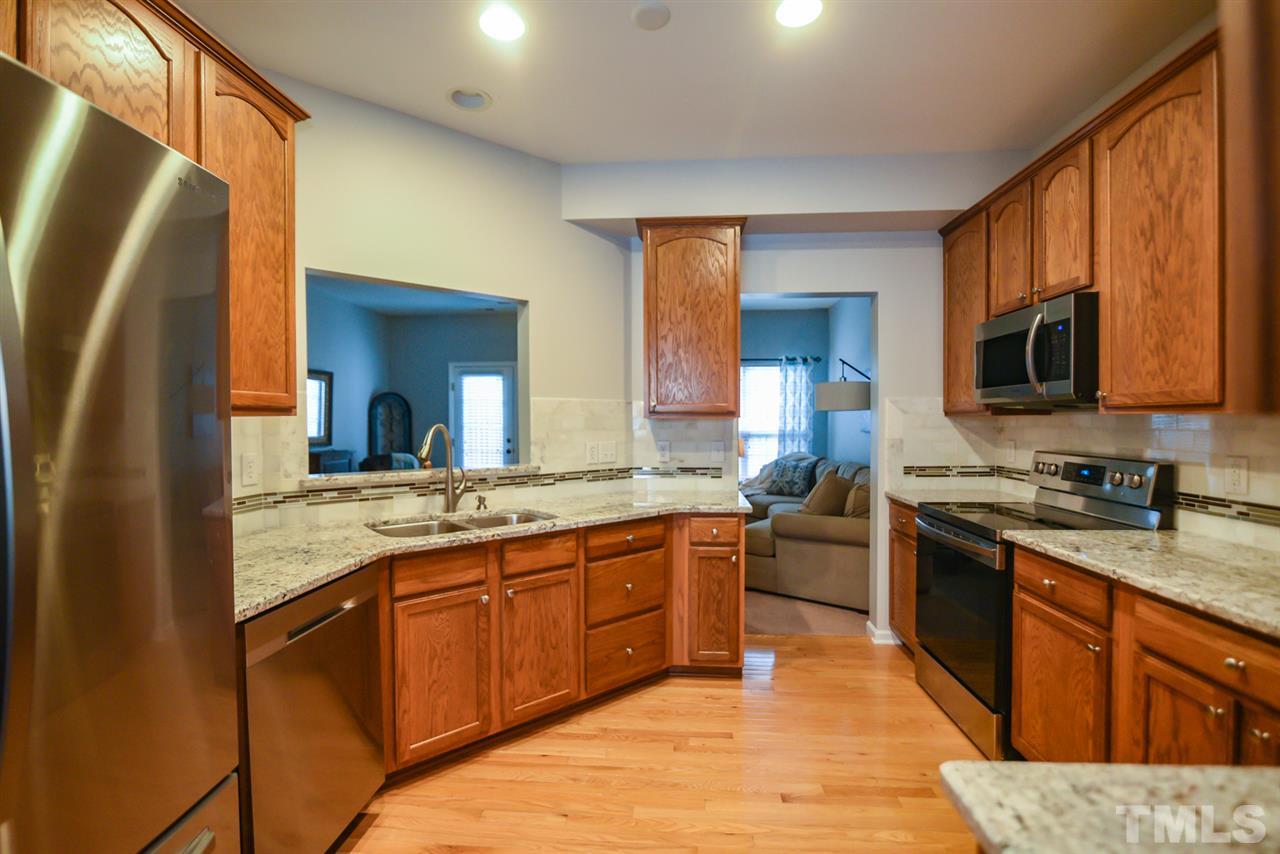 3109 Winding Waters Way Raleigh, NC 27614 - Photo 8 of 18 Awe-inspiring kitchen is well equipped with brand new stainless steel appliance for the discerning chef!