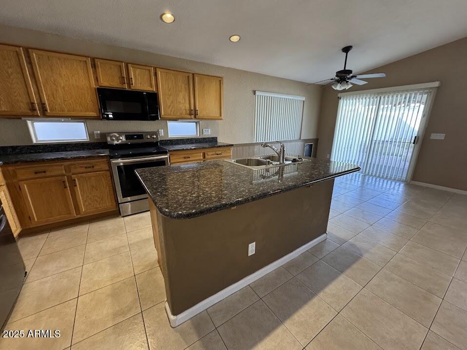 3124 East Piute Avenue Phoenix, AZ 85050 - Photo 11 of 25 a kitchen with granite countertop a sink a counter top space appliances and cabinets