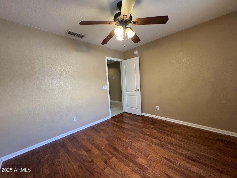 3124 East Piute Avenue Phoenix, AZ 85050 - Photo 16 of 25 wooden floor in an empty room